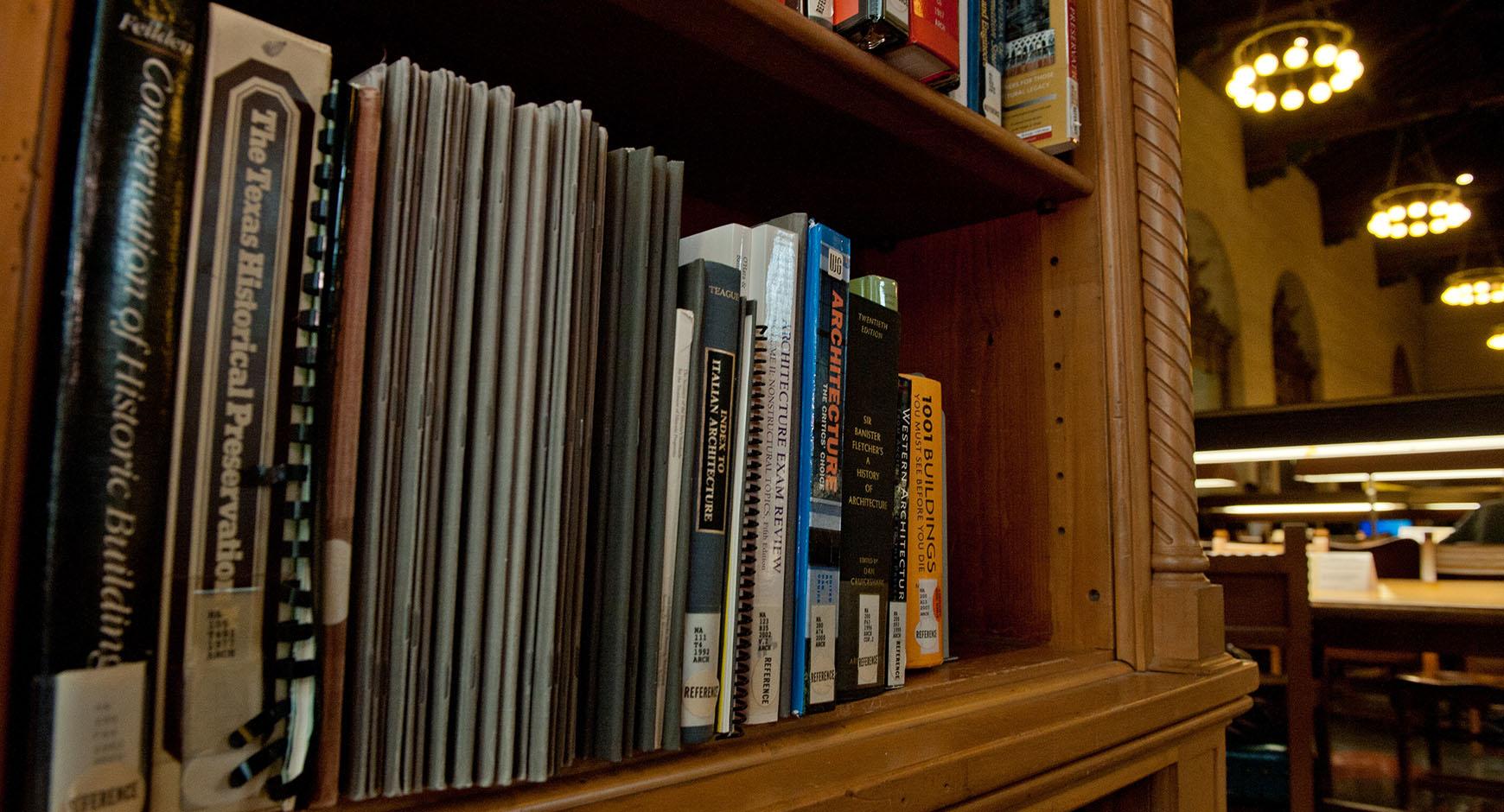 books on a shelf at the architecture and planning library