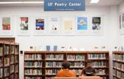 book shelves with title of Poetry Center on wall